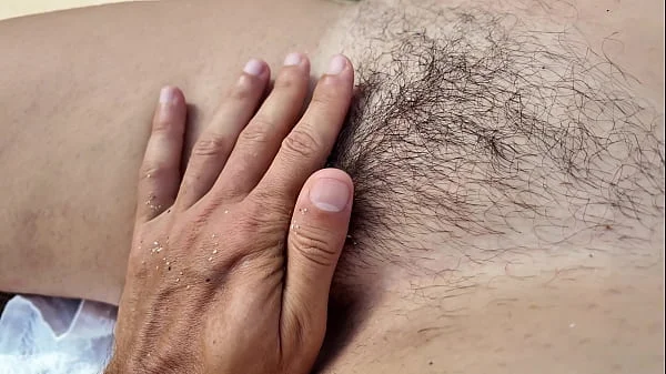 Suddenly a Stranger sneaks up and starts Touching Milf`s hairy Pussy on the Beach