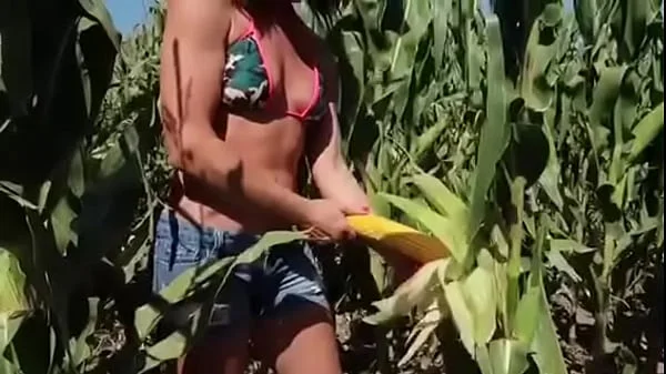 Riley Jacobs checking corn - PREVIEW