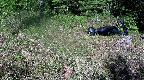 Outdoor hogtie in hot summer day.