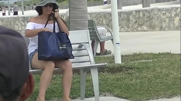 Upskirt Wife 27 - Heather Silk flashing her shaved pussy to voyeurs in public park!